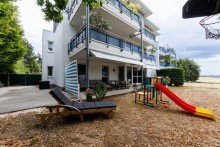 ...mit 2 Terrassen, Markisen und Windschutz Moderner Familientraum: Gartenwohnung am Weinberg