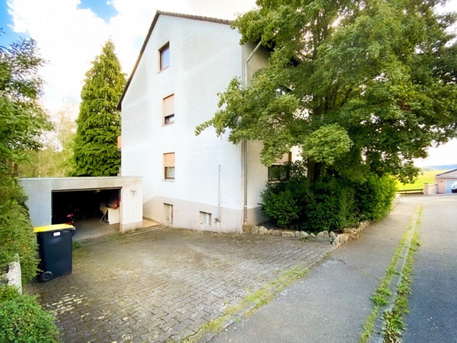 Au�enansicht Doppelgarage/Hof Mehrfamilienhaus Hohenstein / Born