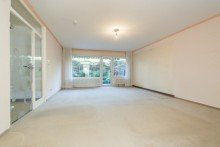 Wohnzimmer mit gro�er Fensterfront... Terrassenwohnung mit kleinem Garten in ruhiger, gr�ner Lage von Wiesbaden Biebrich
