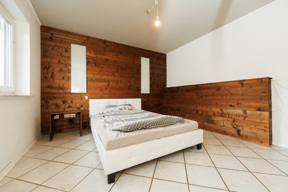 Schlafzimmer EG Mehrfamilienhaus Heidenrod / Laufenselden