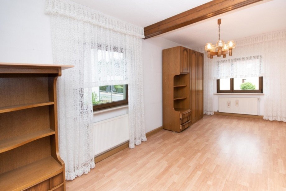 Wohnzimmer Einfamilienhaus H�nstetten / Strinz-Trinitatis