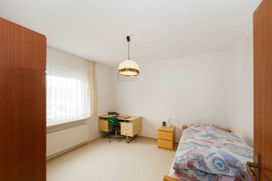 Schlafzimmer OG Mehrfamilienhaus Taunusstein / Bleidenstadt