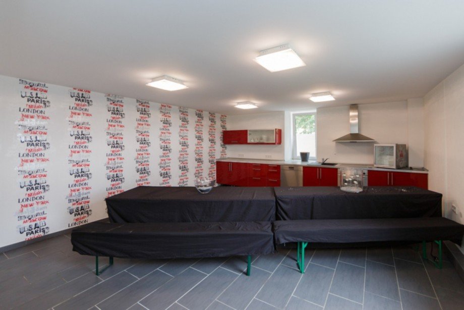 Wohnzimmer mit offener K�che - EG Wohnung Mehrfamilienhaus Schlangenbad / Georgenborn