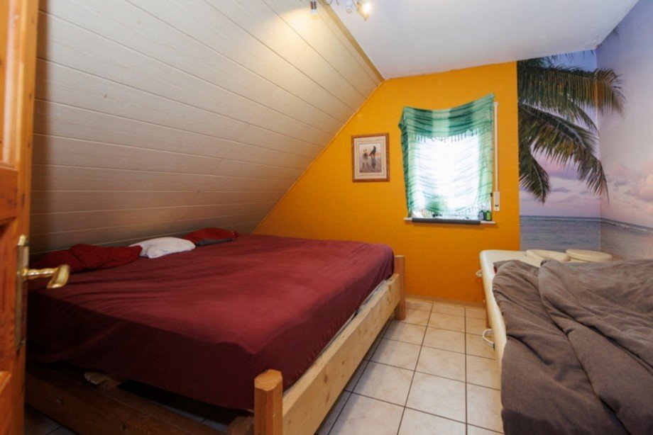 Schlafzimmer DG Mehrfamilienhaus Heidenrod / Laufenselden